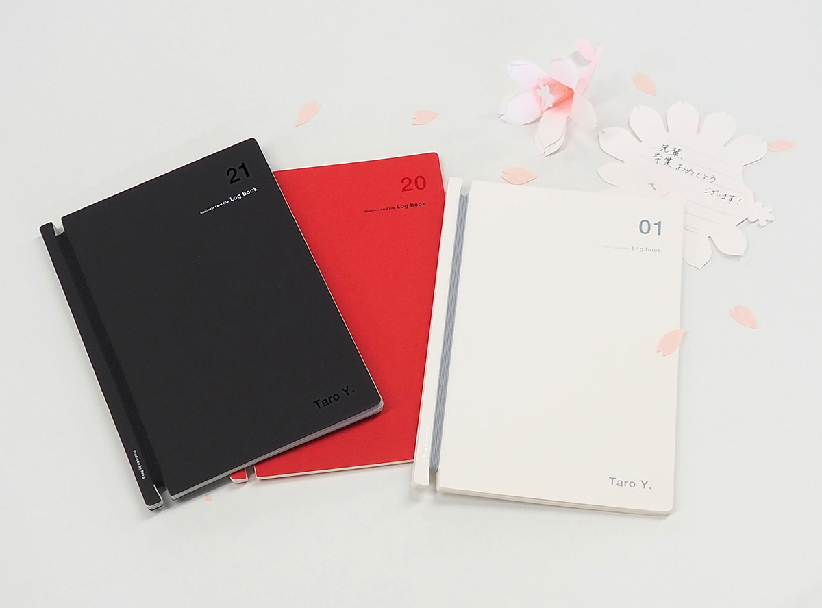 黒、白、赤のLogbookと桜のイメージ